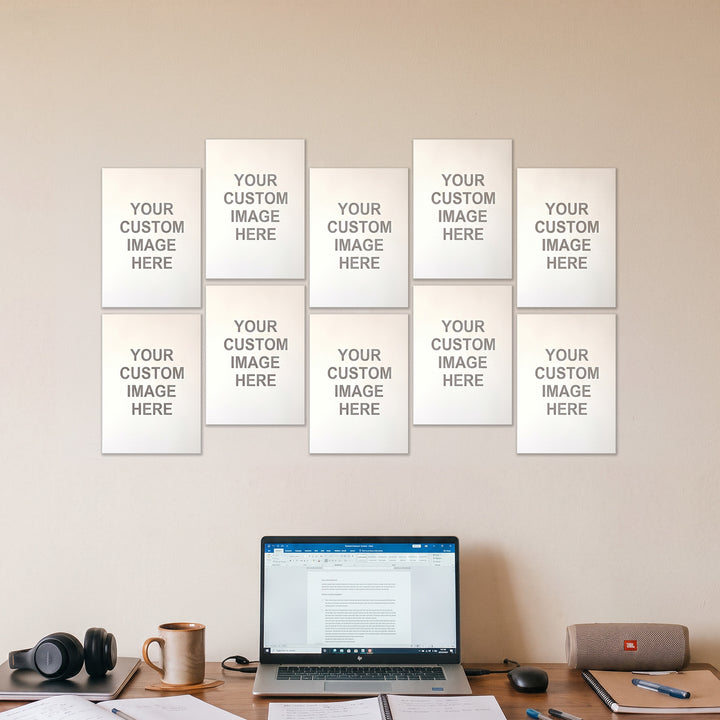 10 A5 posters on a wall above a desk