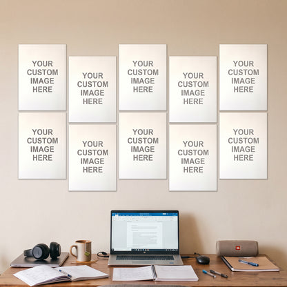 10 A4 posters on a wall above a desk