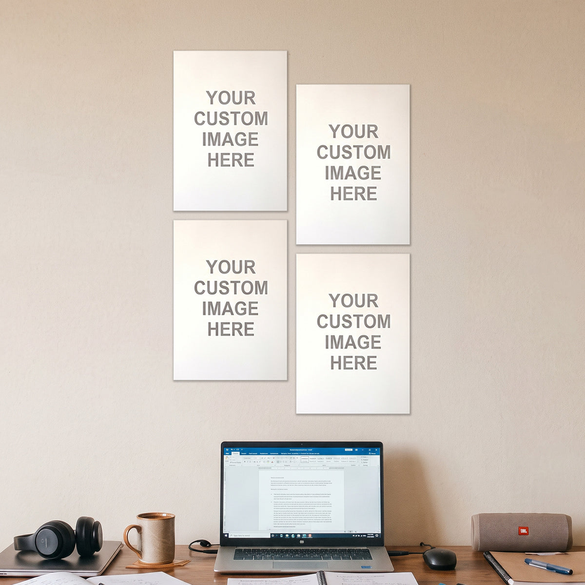 4 A4 posters on a wall above a desk