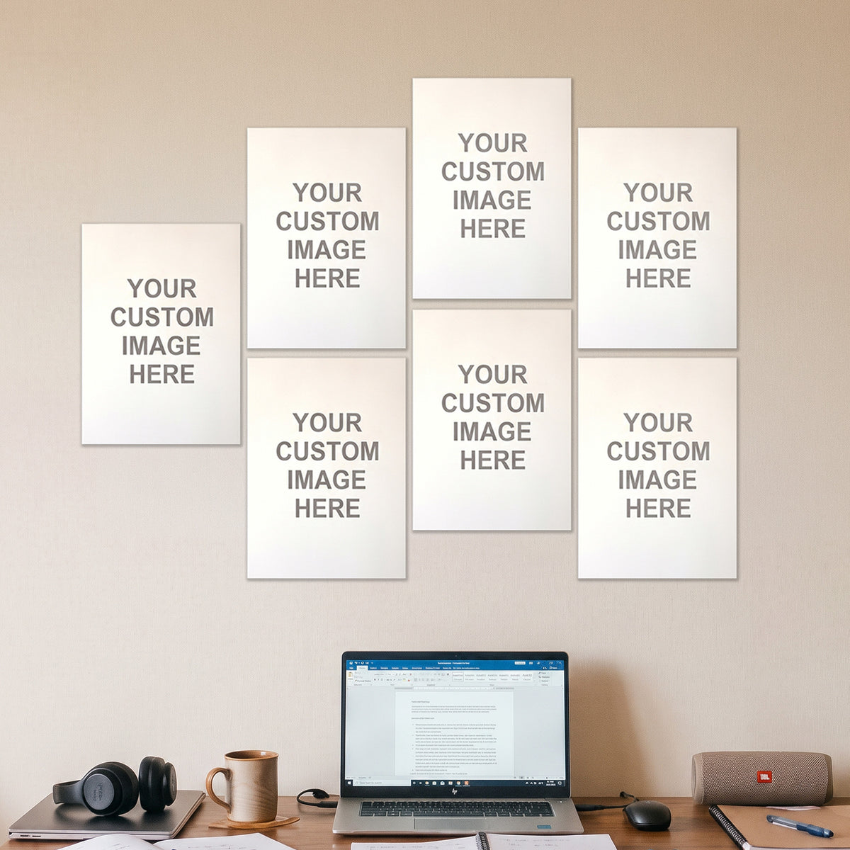7 A4 posters on a wall above a desk
