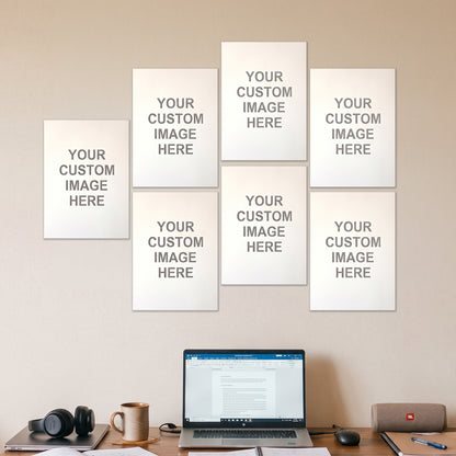 7 A4 posters on a wall above a desk