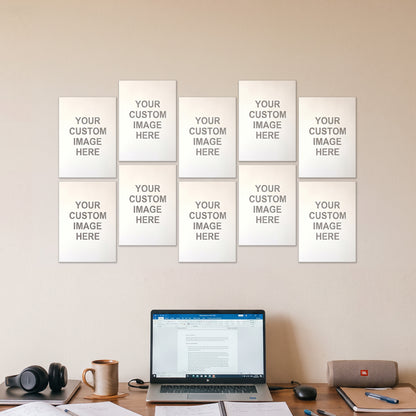 10 A5 posters on a wall above a desk