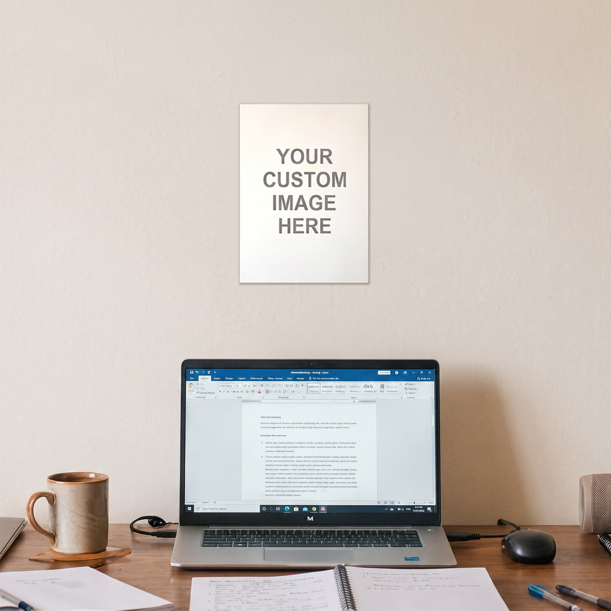 1 A5 poster on a wall above a desk