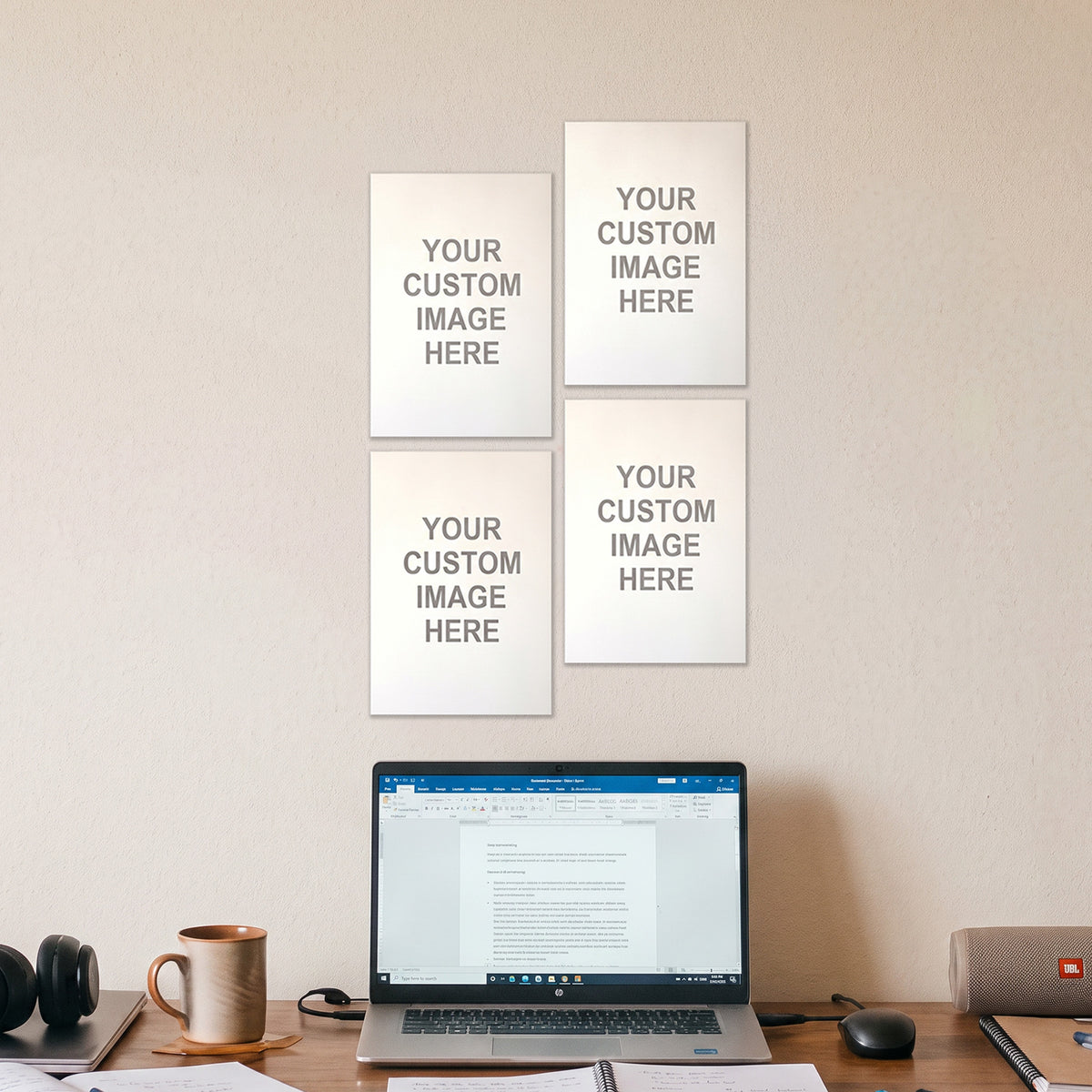 4 A5 posters on a wall above a desk